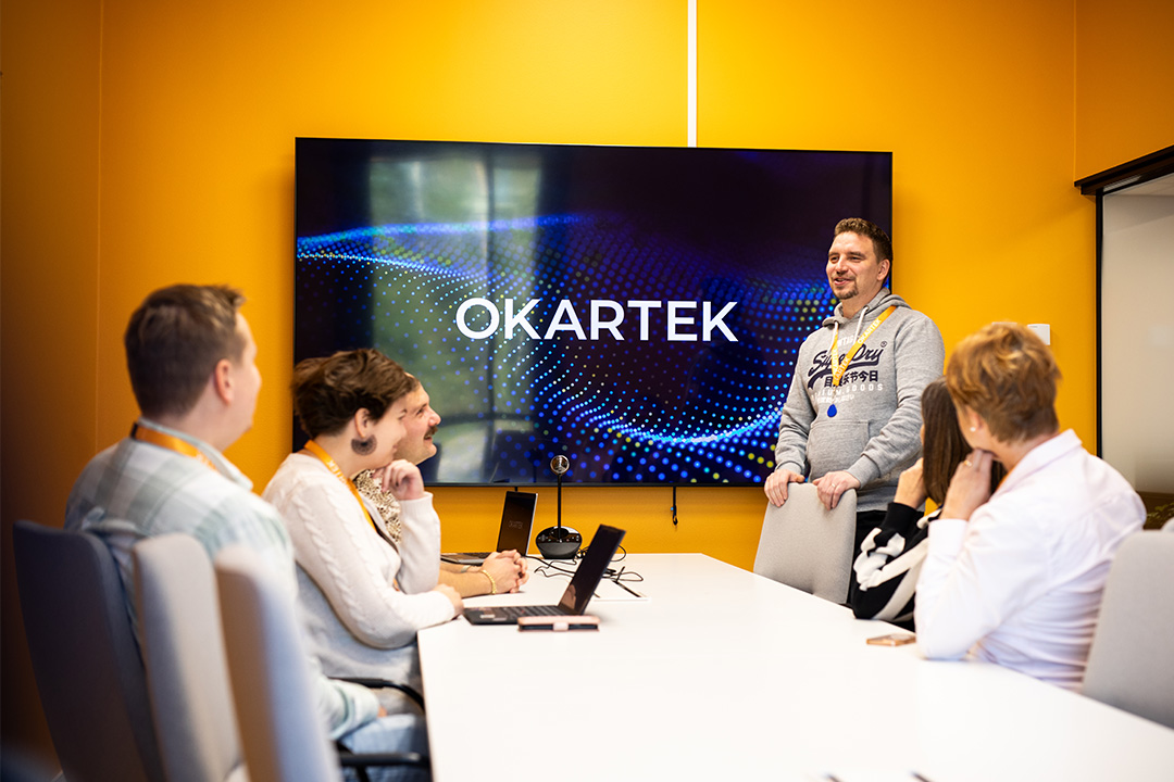 Okartek people in a meeting room